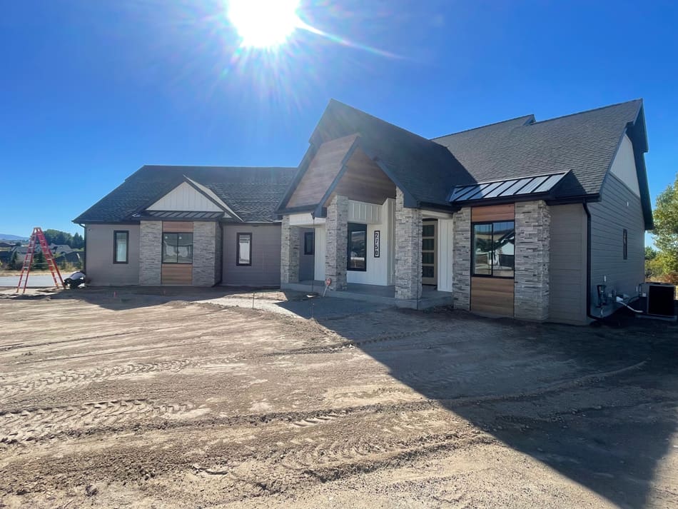 image3 Gorgeous stone beamed home. Yard is still under construction